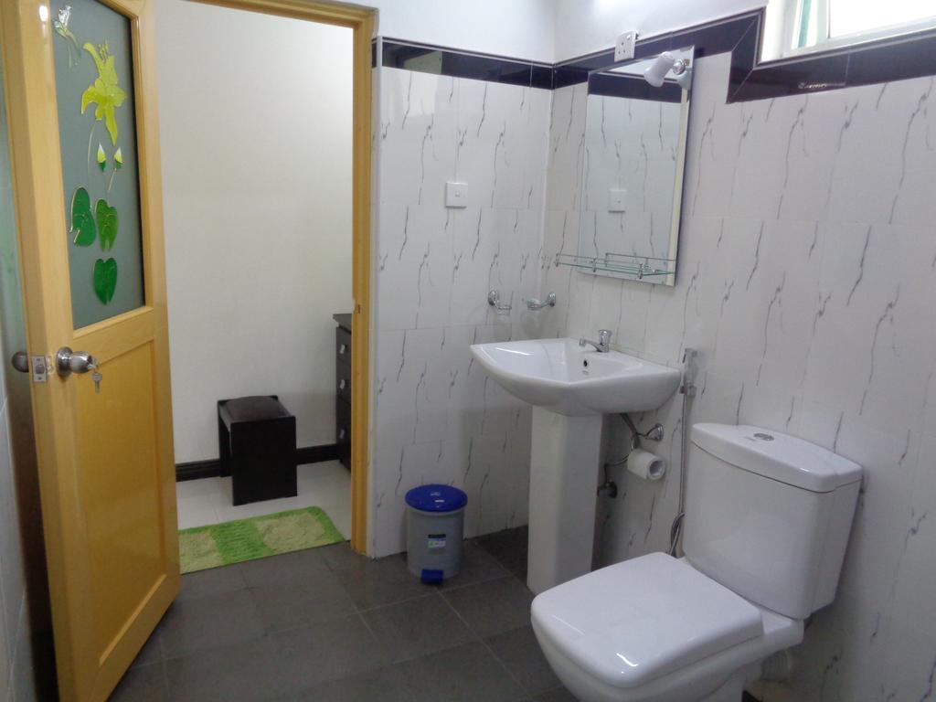 Man Guest Polonnaruwa Hotell Rom bilde